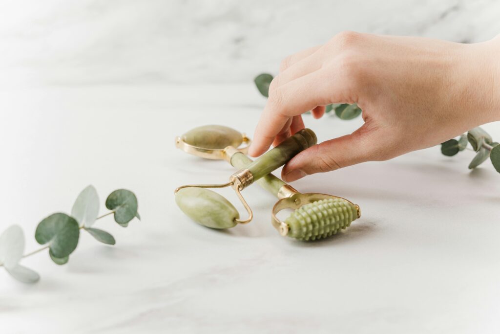 Eco-friendly reusable jade rollers and natural skincare tools as sustainable alternatives to single-use products